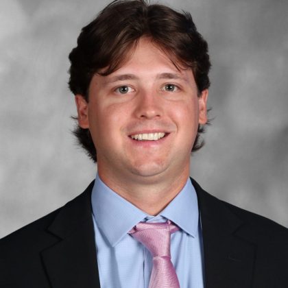 Mr. Conor McCue B.A.